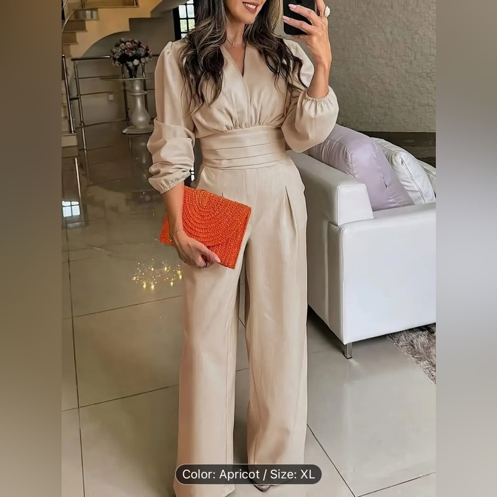 Stylish One-Piece Elegant V-Neck Long Sleeve Jumpsuit with Practical Pockets.